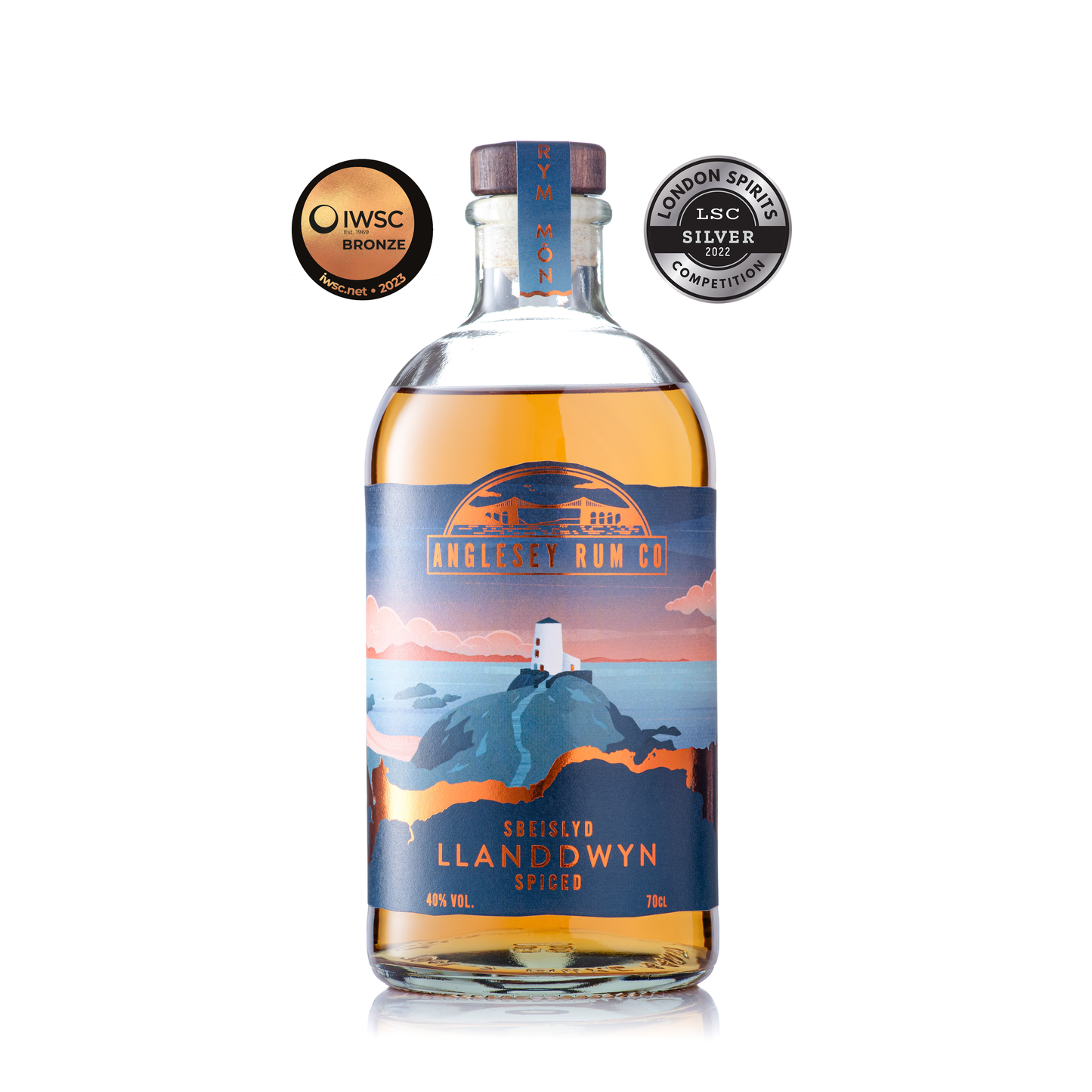 Llanddwyn Spiced Rum bottle with two award medals – Welsh spiced rum from Anglesey inspired by Llanddwyn Island