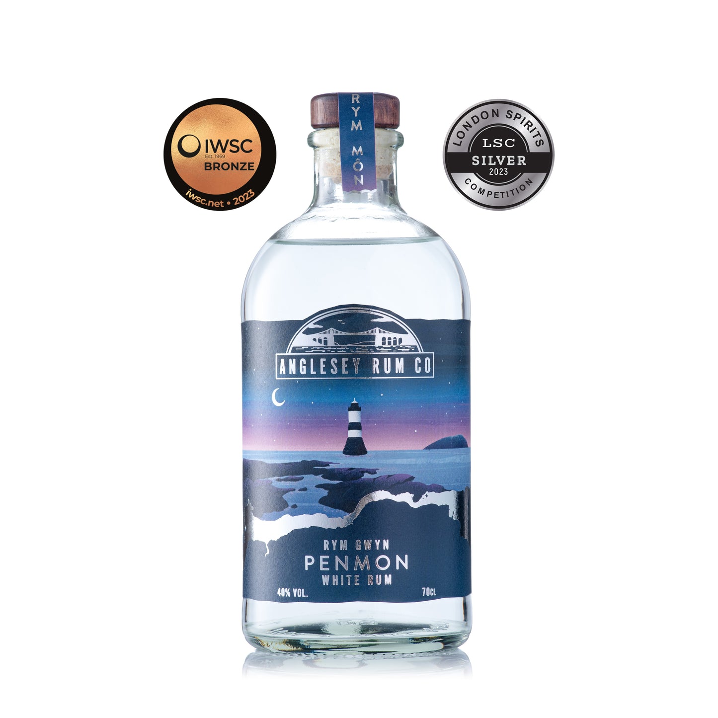 Penmon White Rum bottle with two awards medals – Welsh white rum from Anglesey inspired by Penmon Lighthouse
